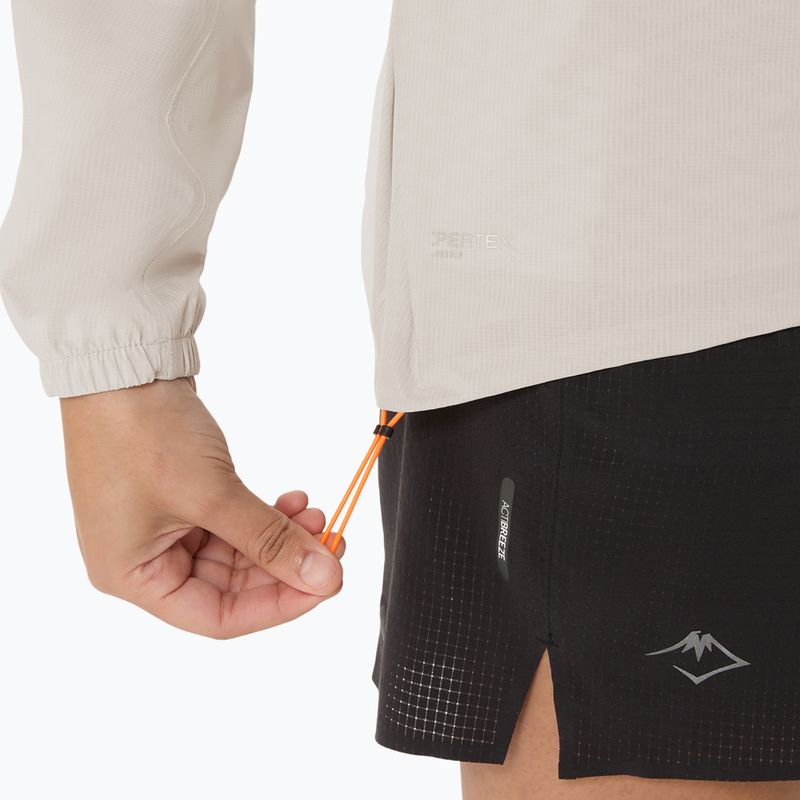 Dámská běžecká bunda ASICS Fujitrail Elite Waterproof cream 10