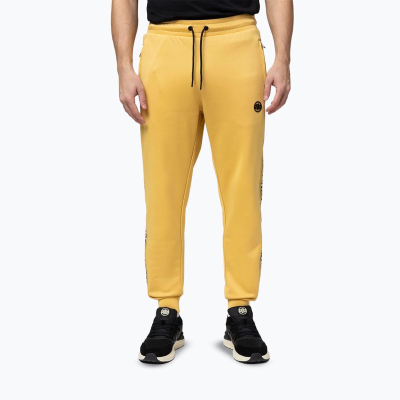 Pánské tepláky Pitbull Trackpants Tape Logo Terry Group pale yellow