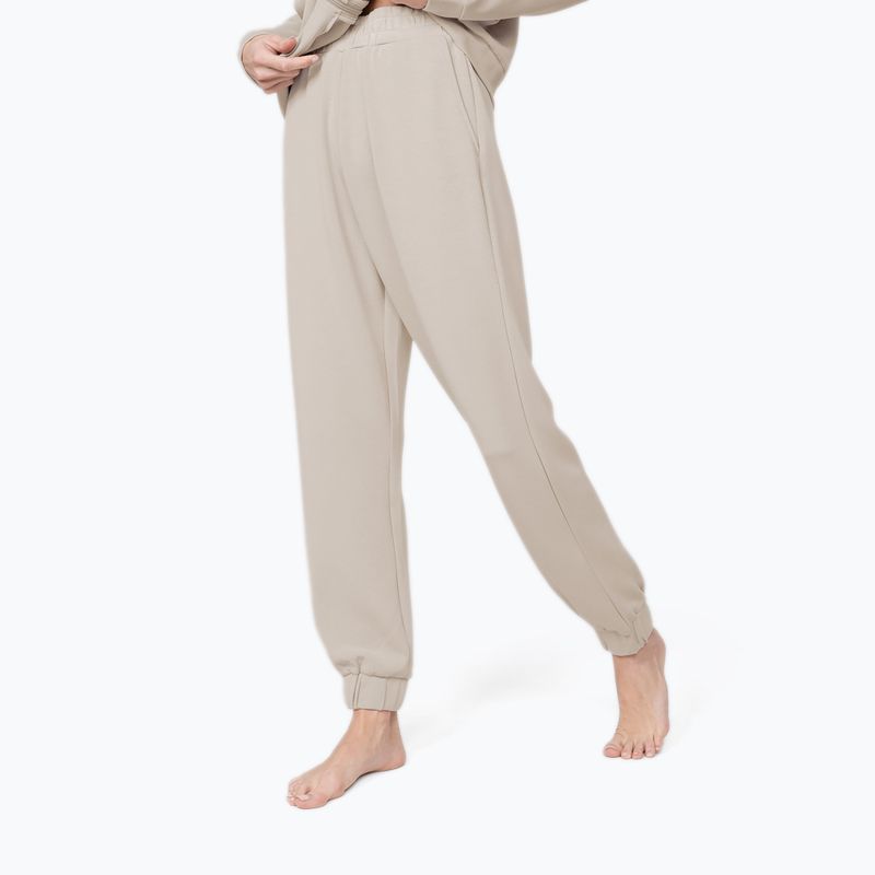 Dámské kalhoty na jógu 4F H4Z22-SPDD022 beige