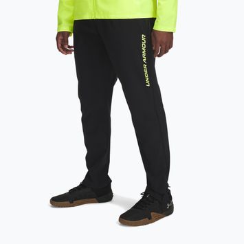 Pánské běžecké kalhoty Under Armour Storm Run black / high vis yellow / reflective