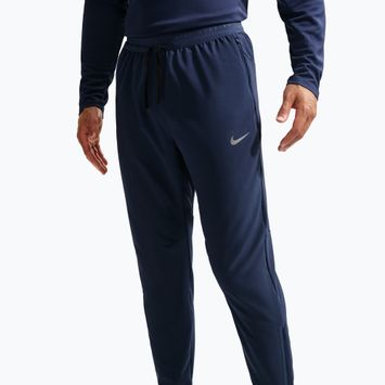 Pánské běžecké kalhoty Nike Stride Dri-Fit Woven midnight navy